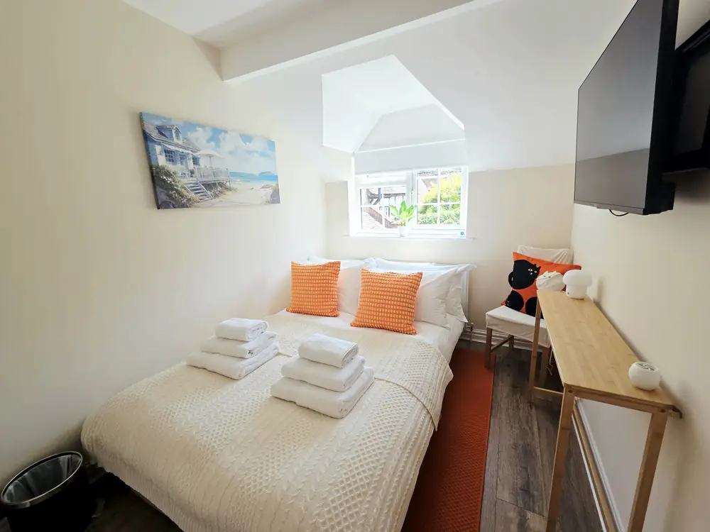 The second bedroom with the sofa bed made up as a double