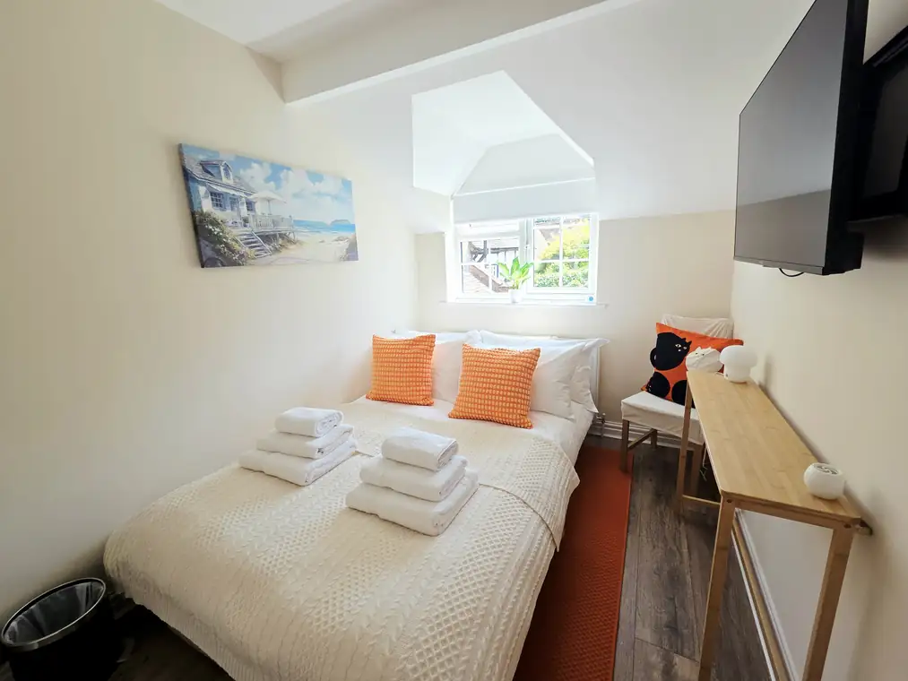 The second bedroom with the sofa bed made up as a double