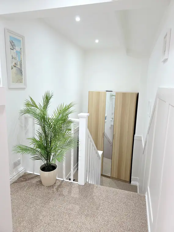 The landing at the top of the stairs