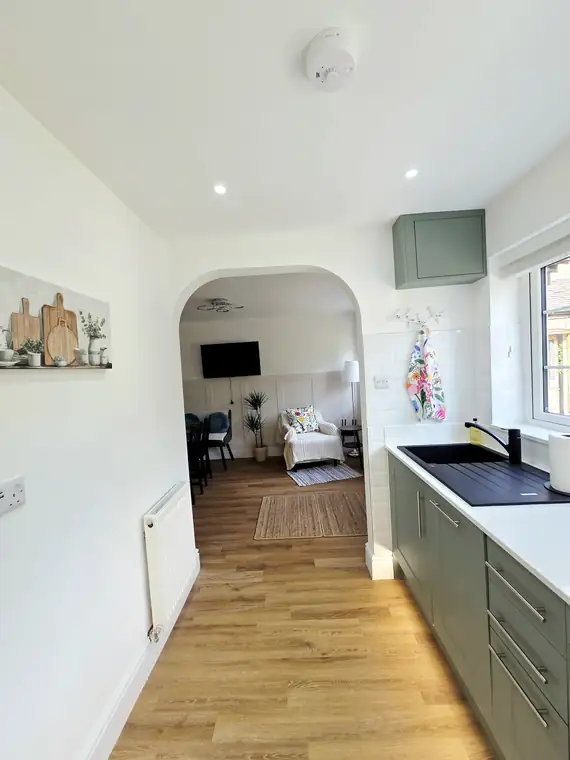 Looking through the kitchen arch into the dining space
